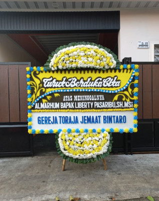 Papan Bunga Duka di Umbunasi